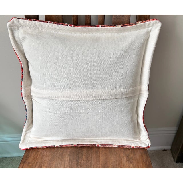 Beautifully woven pillow cover sourced in Turkey with a detailed geometric pattern, predominated by burnt orange tones....