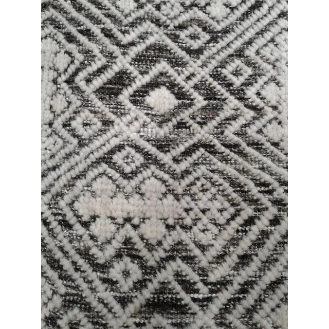 Beautiful hand knotted modern rug. Made of 75% viscose and 25% cotton with very modern design and colors, this extremely...