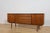 This teak sideboard was manufactured by the British furniture maker Nathan Furniture during the 1960s. The piece...