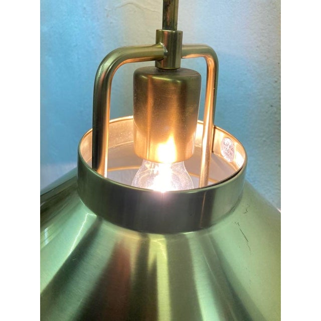 Height-adjustable Danish pendant lamp from the 1960s and 1970s, single-light (E27 socket), designed by Fritz Schlegel....