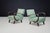 Sculptural Art Deco lounge chairs by Jindřich Halabala, featuring elegant bentwood armrests and original upholstery; a...