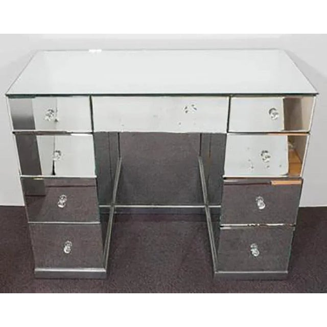 Dramatic mirrored Art Deco desk with glass ball drawer handles. With original mirrors in Original condition and a chrome...