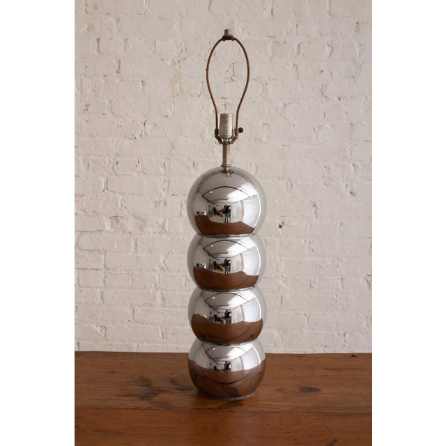 A mid century chrome "caterpillar" lamp attributed to George Kovacs. Stacked ball form silhouette. Larger in scale, as...