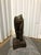 A compelling and thought-provoking abstract bronze sculpture celebrating the strength, grace, and movement of the female...