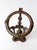 This antique Gothic Revival iron plant stand features a tall architectural form with pierced scrollwork and quatrefoil-...