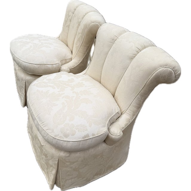 A Pair of Slipper chairs upholstered Soft Ivory Damask A Poised Pair of Slipper Chairs that clearly understand their role....