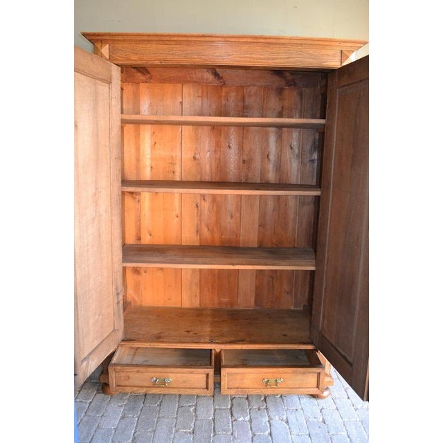 Description: 19th-century German oak cabinet. Height: 209 cm. Width: 150 cm. Depth: 66 cm. Entirely removable. Shelves...