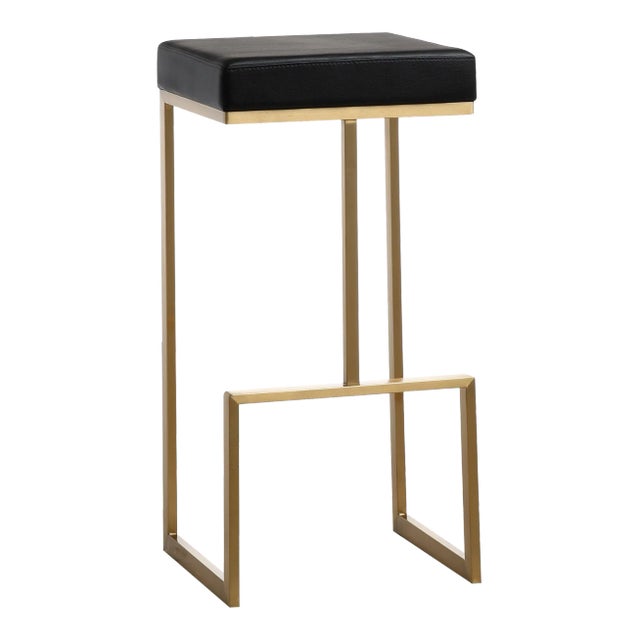 Furnish your kitchen or bar area in contemporary style with the Ferrara barstool. The gold solid stainless steel frame...