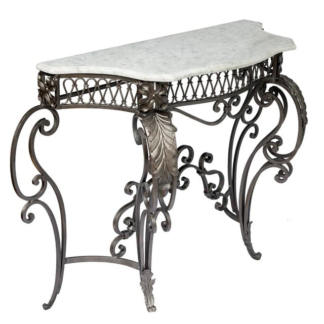 A 20th Century, Handcrafted Iron Console with a Honed Carerara Marble Top with special rounded edges. Monochromatic Bronze...