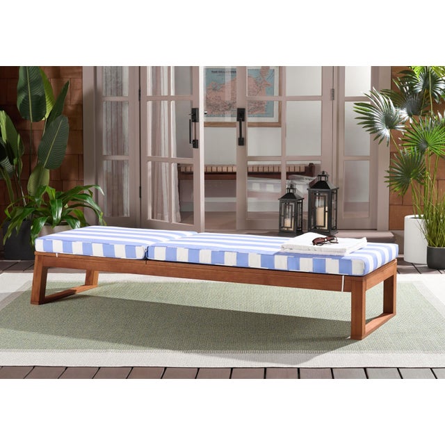 Discover the Sophie Lounger in Natural and Baby Blue Stripe, the ultimate relaxation companion for your outdoor space....