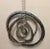 Enjoy the sensory delights of this marvelous metal mobile/hanging sculpture Five concentric circles in decreasing sizes...