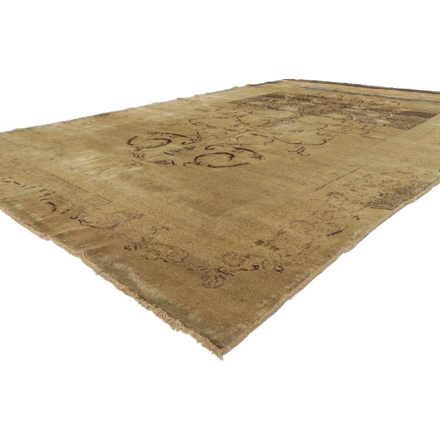 51454 Vintage Turkish Oushak Rug, 07'00 x 11'03. Rustic sensibility meets beguiling charm in this hand knotted wool...