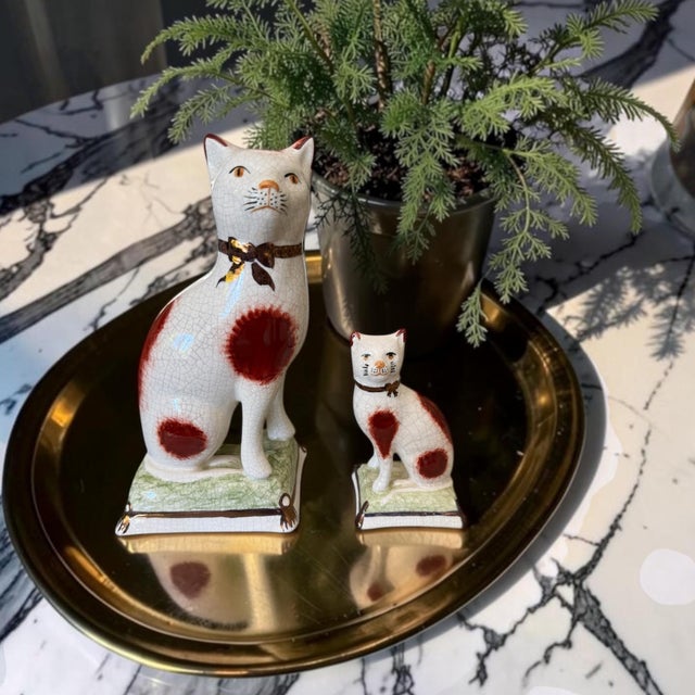 A charming vintage English Staffordshire cat duo, thoughtfully paired to create the look of a mother and kitten. While...