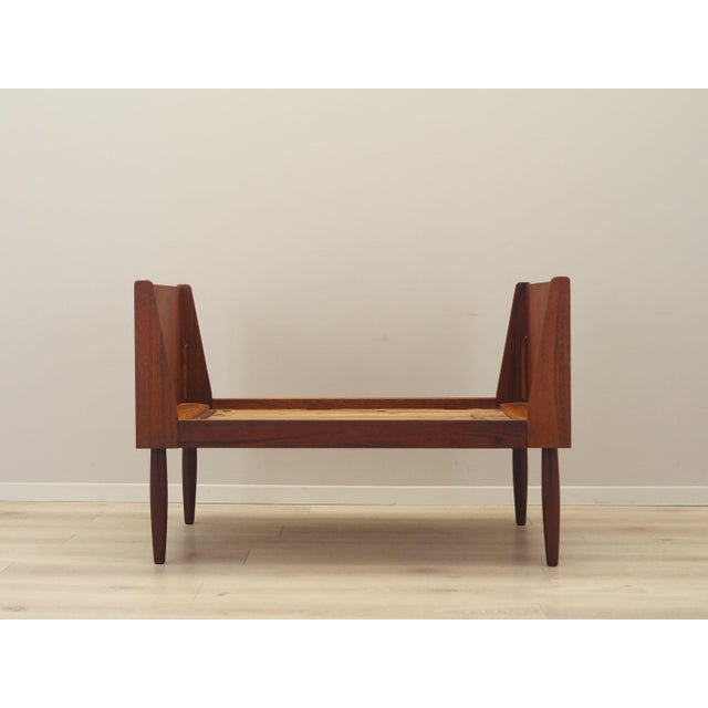 The bed was made in the 1970s, Danish production. The structure is covered with teak veneer. The legs are made of solid...