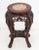Chinese Red Marble Inset Rosewood Pedestal Table, the carved pierced apron with floral motif, on four cabriole legs...
