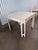 I cannot find this particular game table. It features border and corner fretwork. The legs have Moroccan cuts. The top is...
