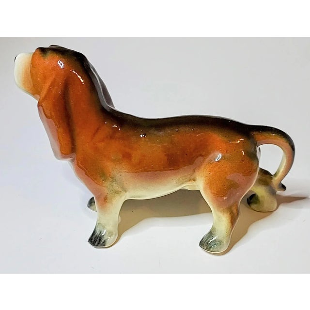 This is the actual cutest basset hound figurine I've laid eyes on. So stinking cute!!! He's so small I'm just going to...