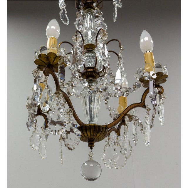 Brass ceiling pendant with crystal drops and one ball French, circa 1960 One drop with a broken tip will be replaced. Good...