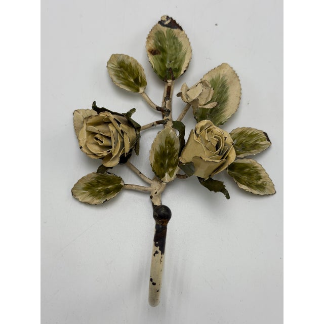 This lovely rustic tole wall hook is too pretty to cover! Light tones of green and white with roses, this functional as...