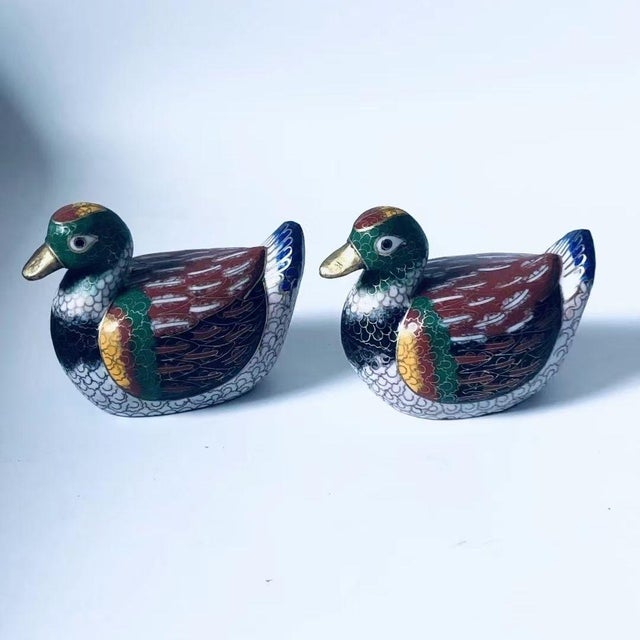 This is a charming pair of vintage cloisonné enamel Mandarin duck figures, attributed to the "export creation" period of...