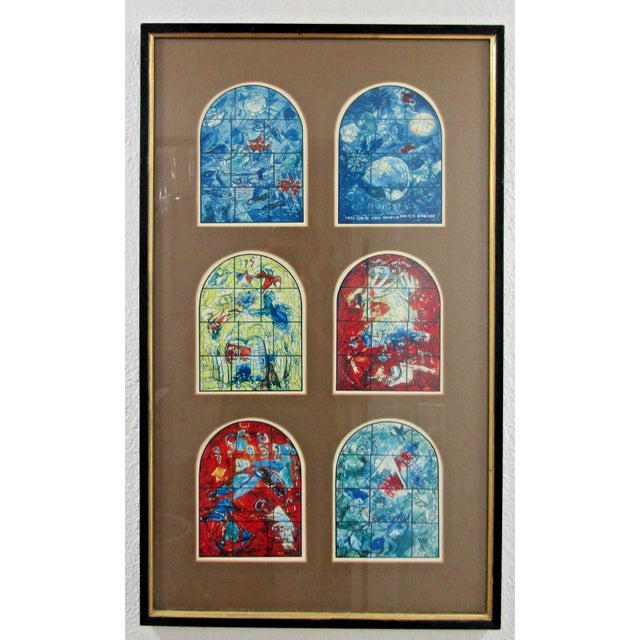 This is a framed original lithograph print by artist Marc Chagall from the 1960s titled "Windows of Jerusalem." This...