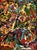 This acrylic on canvas board is signed on the lower right. Colorful abstract images incorporate faces, in the manner of...