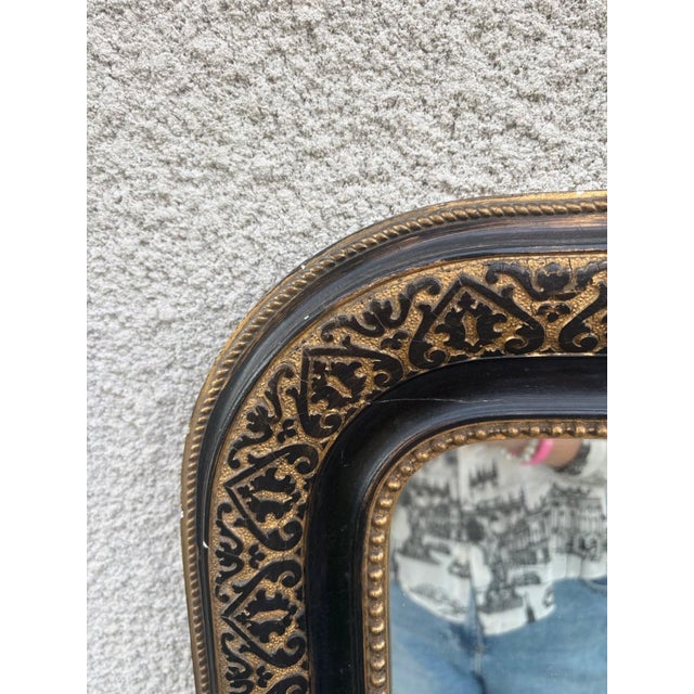 Magnificent Napoleon III style mantel mirror, with elegant proportions characteristic of its period: rounded upper...