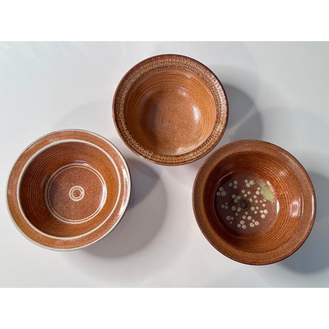 This beautiful set of three high quality ceramic bowl was created by the renown German ceramist Helma Klett (1908-1996)...