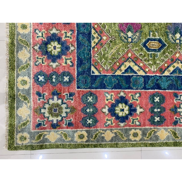 Ava Kazak Light Green Hand Knotted Wool Rug. This exceptional piece is a contemporary interpretation of classic tribal...