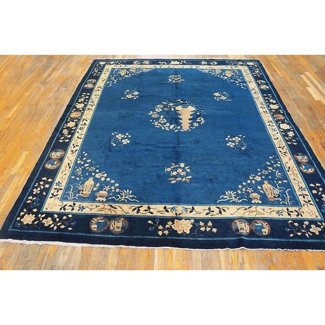 This nineteenth-century Chinese Peking carpet is a quintessential example of "pictorial" weaving, representing the height...