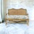 This is a mid-century French Louis XV style caned settee with an antique ivory finish. The linen cushion is new and in...