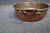 Antique solid copper jam pan featuring a wide, shallow form with riveted brass side handles. Traditionally used for making...