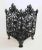 Early 20th century wrought iron basket/planter with lion claw feet. Ornate foliate and acorn design.