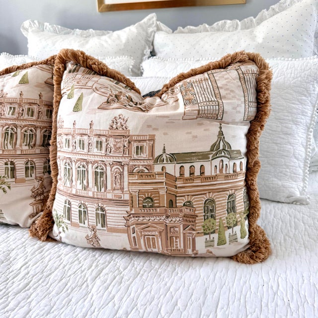 Vintage pair of Palm Beach boulevard pattern cotton throw pillows with fringe trim. The backing is in a darker blue cotton...