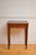 An elegant English mid-19th-century mahogany hall table of exceptionally rare, narrow proportions. Crafted circa 1850,...
