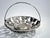 Fruit basket produced around 1900-1915 in Warsaw by the Fraget factory. It was made of white plated metal. It is preserved...