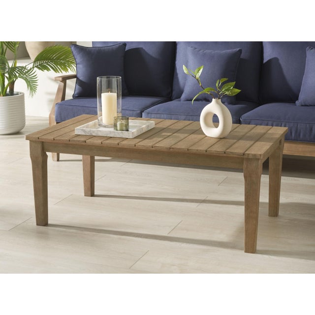 Enhance your outdoor space with the Martinique wood patio coffee table in its natural finish. Crafted from wood, this...
