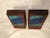 Pair of Mid-Century Modern walnut and enamel bookends. Signed by Ernest John. The perfect accessory to a midcentury...