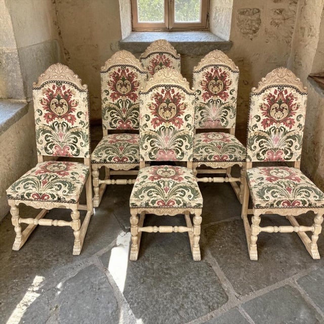 This set of six Renaissance Revival dining chairs features the bold lines and carved detail that give the style its...