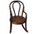 This rare late 19th-century bentwood children's rocking chair, crafted by Fischel in Czechoslovakia, Retaining its...