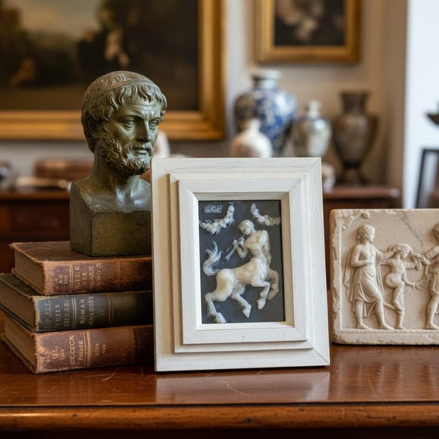 Campbell G. Paxton (American, b. 1948) framed polymer clay relief titled “A Centaur Makes a Cameo Appearance,” c. 1990s....