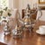 Elegant three-piece Reed & Barton silver-plated tea service in the Winthrop pattern. Sculpted, lobed bodies are...