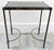 This vintage rectangular bronze and black granite top drink table stands at 18" tall, making it a versatile piece for any...