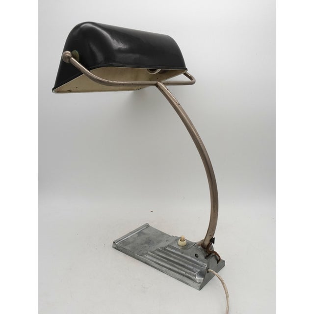 This is one of the first edition of this lamp this piece is attributed to the mentioned designer/maker. It has no...