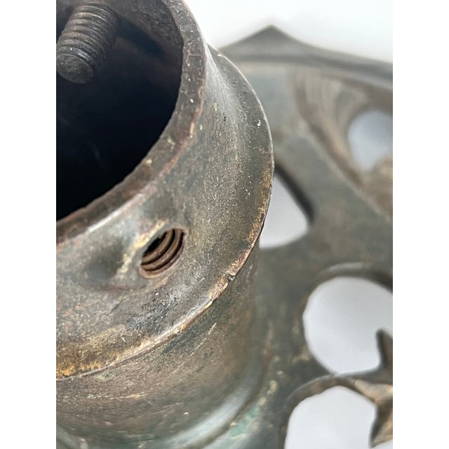 Brill Painted and Parcel-Gilt Iron Christmas Tree Stand, Circa 1920 with cast mark and with stylized pine cones and...