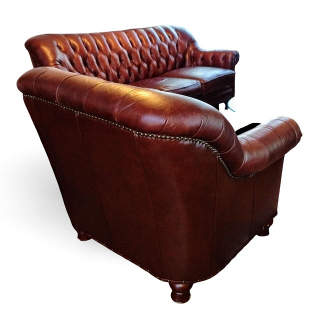 Elevate your living space with this timeless Chesterfield Sofa and Matching Club Chair Set. Crafted from premium, rich...