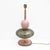 Pair of elegant table lamps crafted in Murano glass in soft pink and green tones, enriched with refined brass details. The...