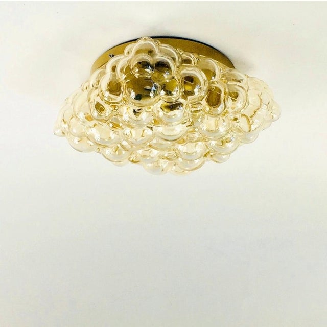Large & rare bubble glass ceiling mount fixture by helena tynell for limburg (germany, 1960s). The amber/champagne colored...