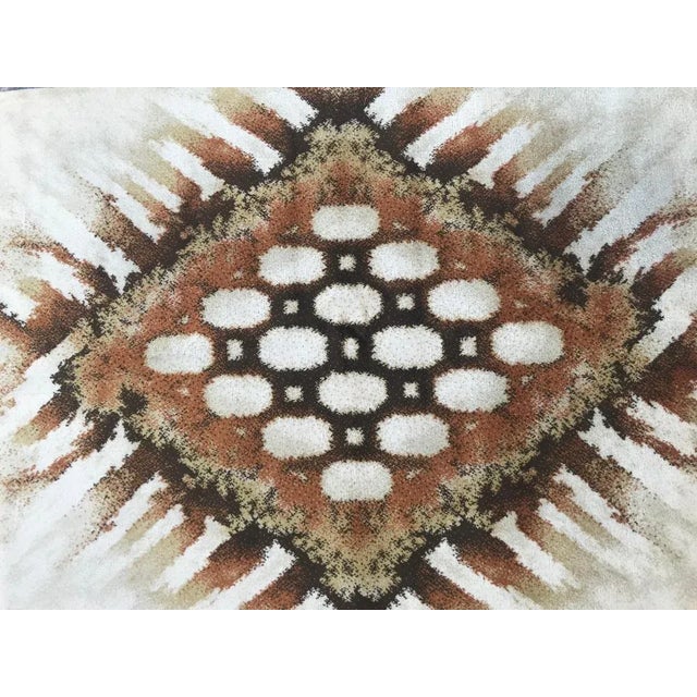 Beautiful modern rug with nice design and light colors, machine made with wool velvet.