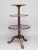 - 18th Century mahogany three tier side table - The elegantly turned stem supports three dish tops of various sizes -...